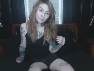 Tattoed cute teen solo striptease shows